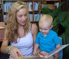 mom reading with her toddler